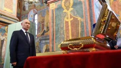 FILE PHOTO: Russian President Vladimir Putin stands by the relics of the Holy Grand Prince Dmitry Donskoy, which were discovered in the course of restoration works, during a service at the Archangel Cathedral of the Kremlin in Moscow, Russia August 20, 2026. Sputnik/Vyacheslav Prokofyev/Pool via REUTERS ATTENTION EDITORS - THIS IMAGE WAS PROVIDED BY A THIRD PARTY./File Photo
