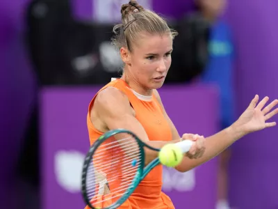 FILE -Tatiana Prozorova of Russia returns a shot to Barbora Krejcikova of the Czech Republic during the first round match of the Korea Open tennis championships at Seoul Olympic Park Tennis Center in Seoul, South Korea, Sept. 16, 2025. (AP Photo/Ahn Young-joon, File)