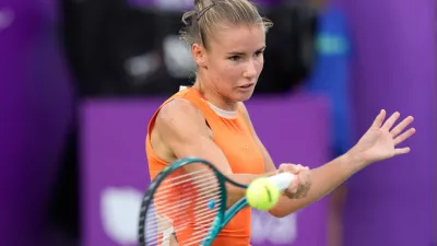 FILE -Tatiana Prozorova of Russia returns a shot to Barbora Krejcikova of the Czech Republic during the first round match of the Korea Open tennis championships at Seoul Olympic Park Tennis Center in Seoul, South Korea, Sept. 16, 2025. (AP Photo/Ahn Young-joon, File)