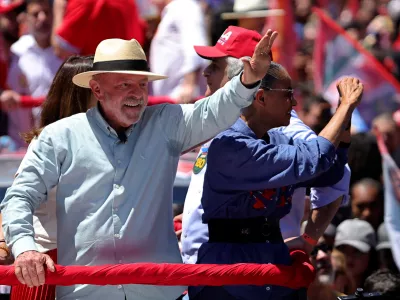 Brazilian President Luiz Inacio Lula da Silva, who is running for reelection, waves to supporters during a campaign rally in Sao Paulo, Brazil, Saturday, Sept. 26, 2026. (AP Photo/Allison Sales)