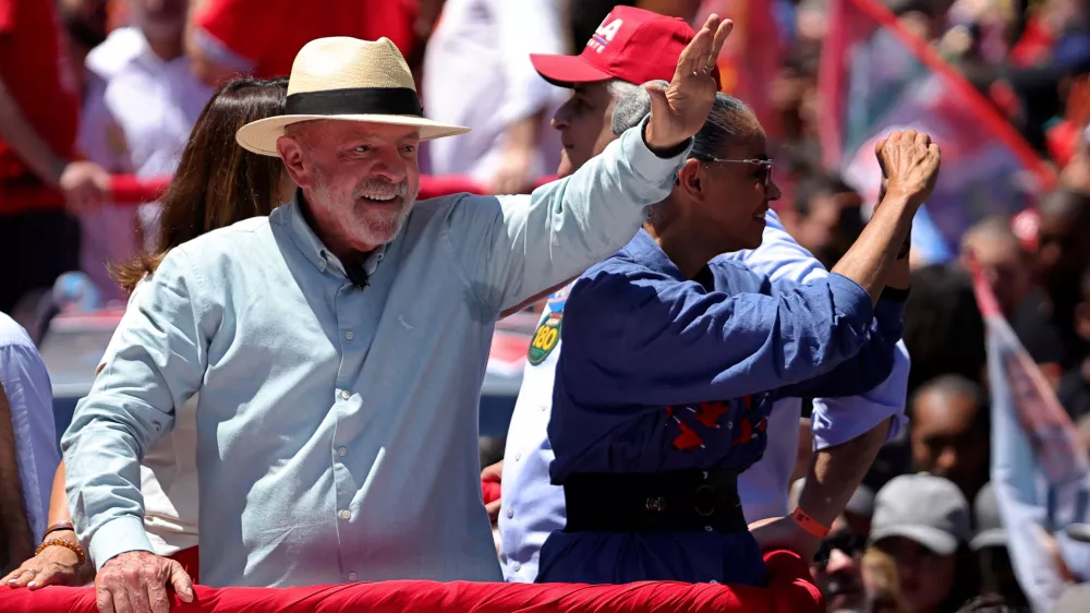 Brazilian President Luiz Inacio Lula da Silva, who is running for reelection, waves to supporters during a campaign rally in Sao Paulo, Brazil, Saturday, Sept. 26, 2026. (AP Photo/Allison Sales)