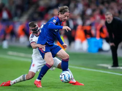 Czechia's Michal Sadilek, left, vies for the ball with Croatia's Luka Modric during the Nations League soccer match between Czechia and Croatia in Prague, Saturday, Sept. 26, 2026. (AP Photo/Petr David Josek)