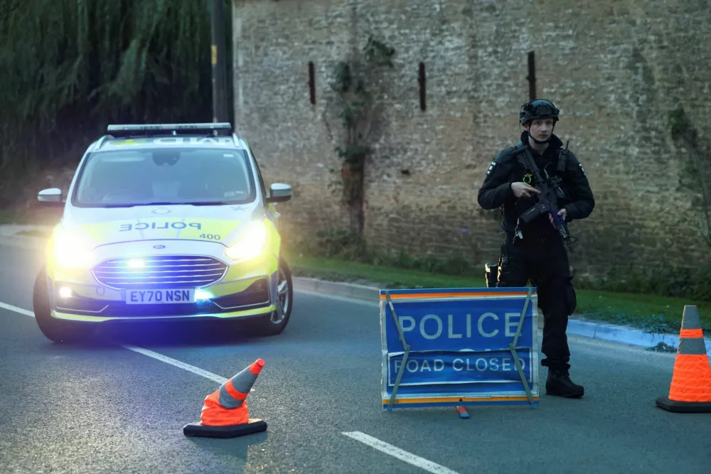 A police officer blocks a road near the RAF Fairford airbase, which hosts United States Air Force (USAF) personnel, in Fairford, Gloucestershire, Britain, September 27, 2026. REUTERS/Toby Shepheard   TPX IMAGES OF THE DAY