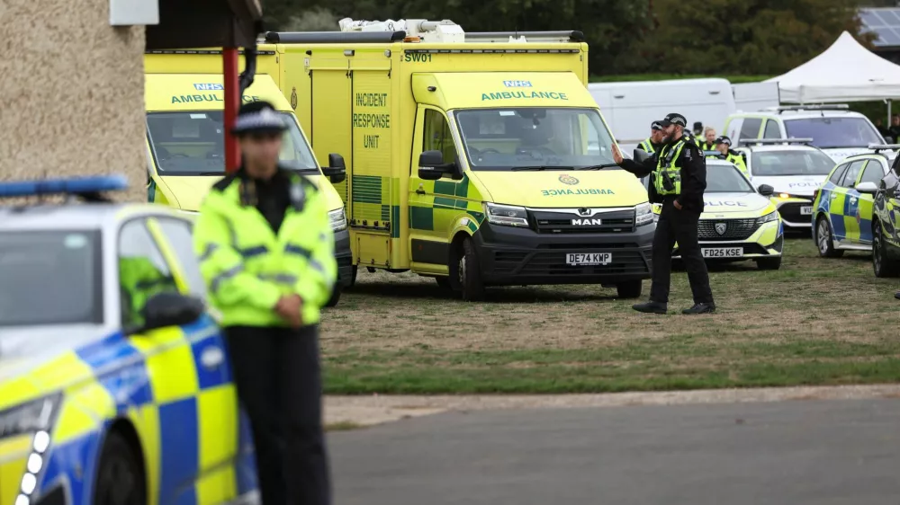 Emergency vehicles are parked at Fairford Youth Football club, near RAF Fairford, which hosts US Air Force personnel, in Fairford, Gloucestershire, Britain, September 27, 2026. Police declared a major incident at UK's Fairford air base after several men were arrested on suspicion of offences under the Explosives Act. REUTERS/Toby Shepheard