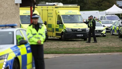 Emergency vehicles are parked at Fairford Youth Football club, near RAF Fairford, which hosts US Air Force personnel, in Fairford, Gloucestershire, Britain, September 27, 2026. Police declared a major incident at UK's Fairford air base after several men were arrested on suspicion of offences under the Explosives Act. REUTERS/Toby Shepheard