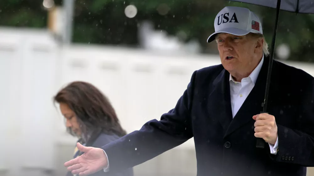 President Donald Trump speaks on the South Lawn of the White House as he arrives, Saturday, Sept. 26, 2026, in Washington. (AP Photo/Rod Lamkey, Jr.)