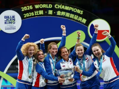 Tennis - Billie Jean King Cup Finals - Final - Ukraine v Czech Republic - Shenzhen Bay Sports Centre Arena, Shenzhen, China - September 27, 2026 Czech Republic's Linda Noskova, Karolina Muchova, Marie Bouzkova, Katerina Siniakova, captain Barbora Strycova, and a teammate celebrate with the Billie Jean King Cup after winning their final matches against Ukraine REUTERS/Tingshu Wang