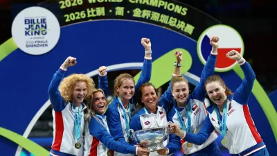 Tennis - Billie Jean King Cup Finals - Final - Ukraine v Czech Republic - Shenzhen Bay Sports Centre Arena, Shenzhen, China - September 27, 2026 Czech Republic's Linda Noskova, Karolina Muchova, Marie Bouzkova, Katerina Siniakova, captain Barbora Strycova, and a teammate celebrate with the Billie Jean King Cup after winning their final matches against Ukraine REUTERS/Tingshu Wang