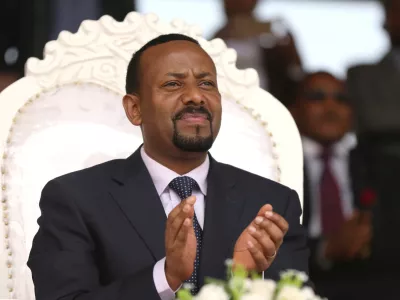 FILE PHOTO: Ethiopia's newly elected prime minister Abiy Ahmed attends a rally during his visit to Ambo in the Oromiya region, Ethiopia April 11, 2018. REUTERS/Tiksa Negeri/File Photo