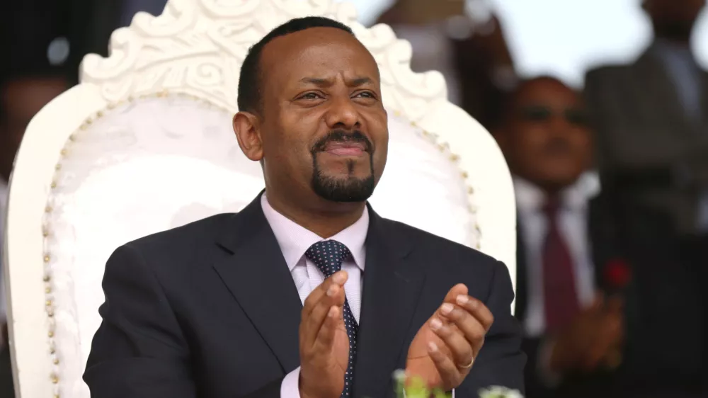 FILE PHOTO: Ethiopia's newly elected prime minister Abiy Ahmed attends a rally during his visit to Ambo in the Oromiya region, Ethiopia April 11, 2018. REUTERS/Tiksa Negeri/File Photo