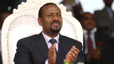 FILE PHOTO: Ethiopia's newly elected prime minister Abiy Ahmed attends a rally during his visit to Ambo in the Oromiya region, Ethiopia April 11, 2018. REUTERS/Tiksa Negeri/File Photo