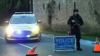 A police officer blocks a road near the RAF Fairford airbase, which hosts United States Air Force (USAF) personnel, in Fairford, Gloucestershire, Britain, September 27, 2026. REUTERS/Toby Shepheard