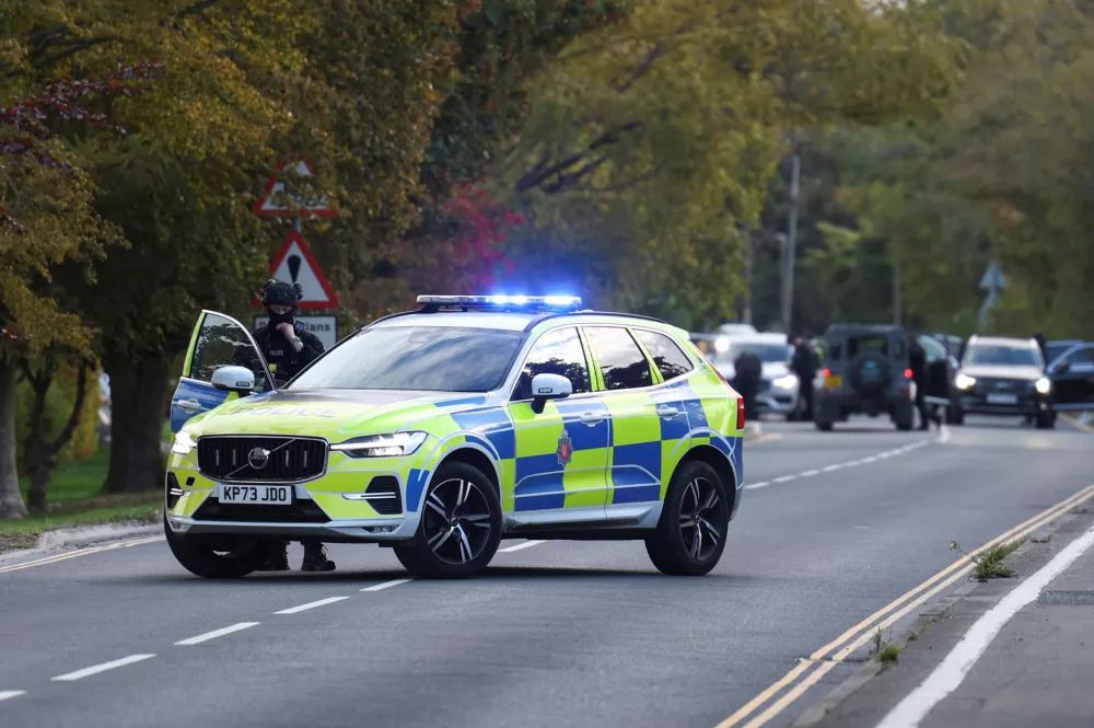 A police officer blocks a road near the RAF Fairford airbase, which hosts United States Air Force (USAF) personnel, in Fairford, Gloucestershire, Britain, September 27, 2026. REUTERS/Toby Shepheard