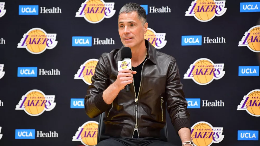 Feb 4, 2025; El Segundo, CA, USA; Los Angeles Lakers vice president of basketball operations and general manager Rob Pelinka speaks before introducing Luka Doncic at UCLA Health Training Center. Mandatory Credit: Gary A. Vasquez-Imagn Images