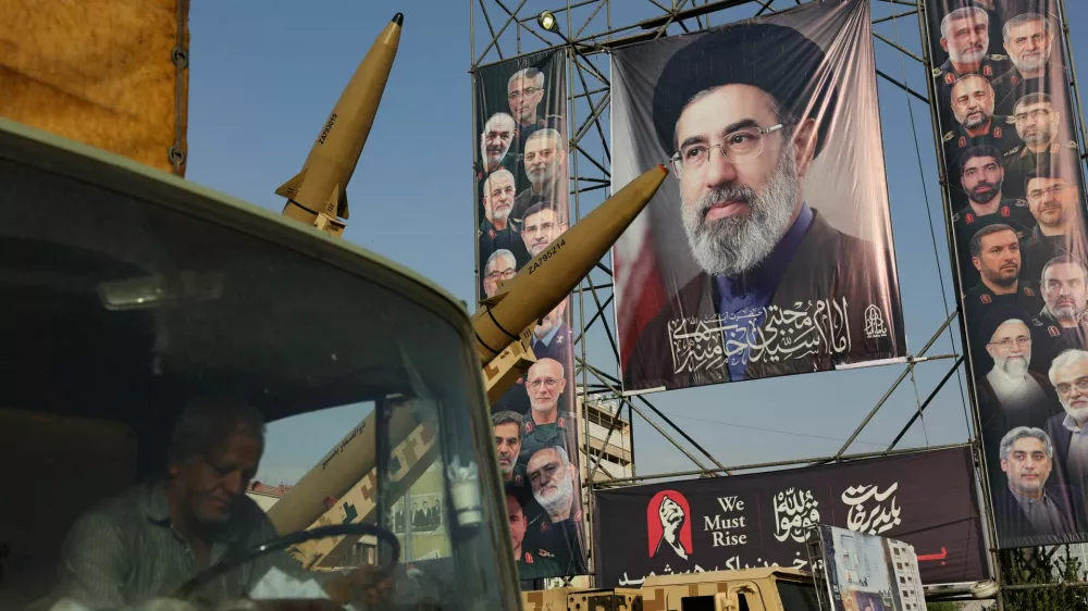 Iranian missiles are displayed next to a banner with a picture of Iran's Supreme Leader, Mojtaba Khamenei, on a street in Tehran, Iran, September 27, 2026. Majid Asgaripour/WANA (West Asia News Agency) via REUTERS ATTENTION EDITORS - THIS PICTURE WAS PROVIDED BY A THIRD PARTY. ISRAEL OUT. NO COMMERCIAL OR EDITORIAL SALES IN ISRAEL. NO ACCESS FOR ISRAELI MEDIA. NO USE BBC PERSIAN. NO USE VOA PERSIAN. NO USE MANOTO. NO USE IRAN INTERNATIONAL. NO USE RADIO FARDA. DIGITAL: NO USE BBC PERSIAN. NO USE VOA PERSIAN. NO USE MANOTO. NO USE IRAN INTERNATIONAL. NO USE RADIO FARDA.