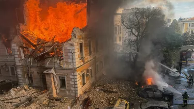 Firefighters attempt to extinguish fire at the site of the Ukraine's Academy of Sciences building hit by a Russian jet-powered drone strike, amid Russia's attack on Ukraine, in Kyiv, Ukraine, September 28, 2026. REUTERS/Sergiy Chalyi