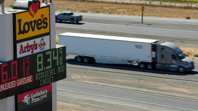 A semi drives past a sign advertising gas and diesel prices along Interstate 5 in Williams, California, U.S., September 28, 2026. REUTERS/Fred Greaves