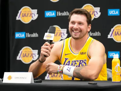 Los Angeles Lakers guard Luka Doncic gestures as he speaks to the media during media day Monday, Sept. 28, 2026, in El Segundo, Calif. (AP Photo/Mark J. Terrill)
