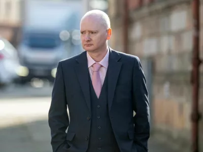 FILE PHOTO: Former snooker world champion Graeme Dott, who is accused of sexually abusing two children between 1993 and 2010, arrives at the High Court in Glasgow, Scotland, Britain, August 24, 2026. REUTERS/Lesley Martin/File Photo
