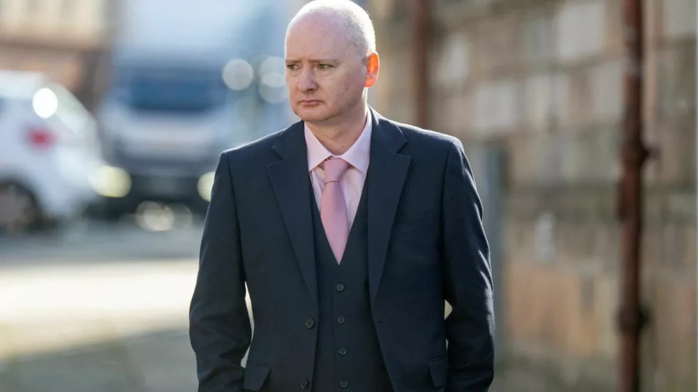 FILE PHOTO: Former snooker world champion Graeme Dott, who is accused of sexually abusing two children between 1993 and 2010, arrives at the High Court in Glasgow, Scotland, Britain, August 24, 2026. REUTERS/Lesley Martin/File Photo