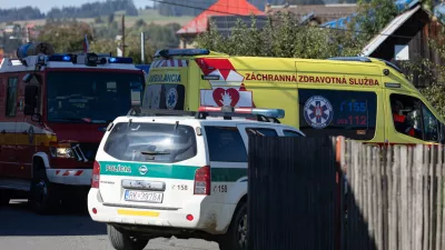 Ambulances are parked near the primary school building following a stabbing attack by a pupil in Staskov, Slovakia, Tuesday, Sept. 29, 2026. (Daniel Stehlik/TASR via AP)