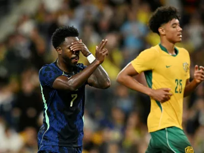 Soccer Football - International Friendly - Australia v Brazil - Suncorp Stadium, Brisbane, Australia - September 29, 2026 Brazil's Vinicius Junior celebrates scoring their fourth goal DARREN ENGLAND/AAP Image via REUTERS   ATTENTION EDITORS - THIS IMAGE WAS PROVIDED BY A THIRD PARTY. NO RESALES. NO ARCHIVES. AUSTRALIA OUT. NEW ZEALAND OUT