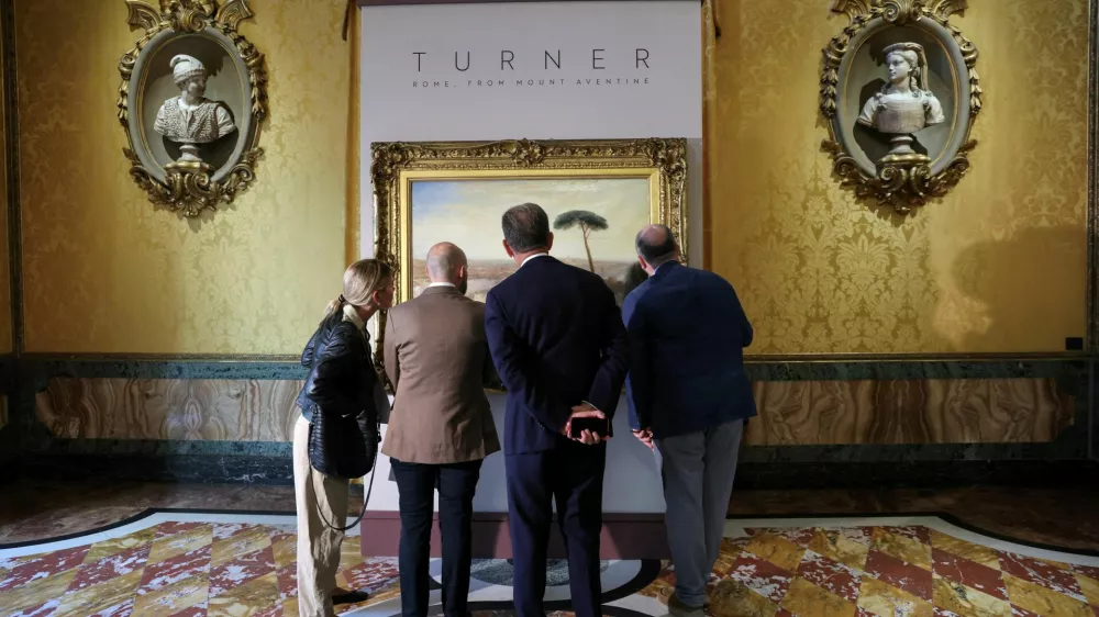 People view William Turner's 1835 painting "Rome, from Mount Aventine", presented by Sotheby's at Palazzo Rondinini, in Rome, Italy, September 29, 2026. REUTERS/Yara Nardi    TPX IMAGES OF THE DAY