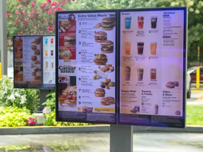 McDonald's drive through signs in New York City, U.S., July 30, 2026. REUTERS/Jordan Tovin