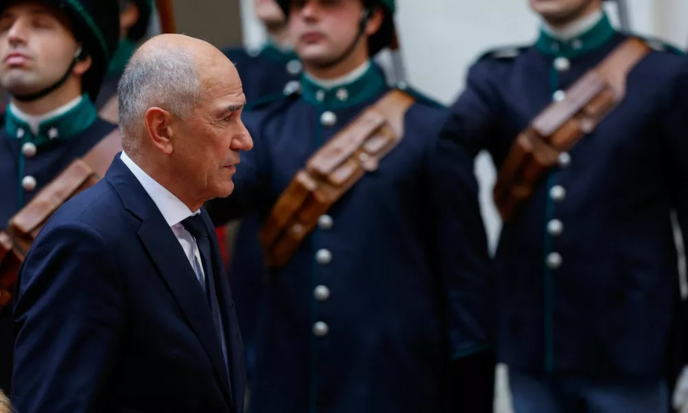 Slovenia's Prime Minister Janez Jansa reviews the honour guard at Chigi Palace as he meets Italian Prime Minister Giorgia Meloni (not pictured) in Rome, Italy, October 5, 2026. REUTERS/Remo Casilli