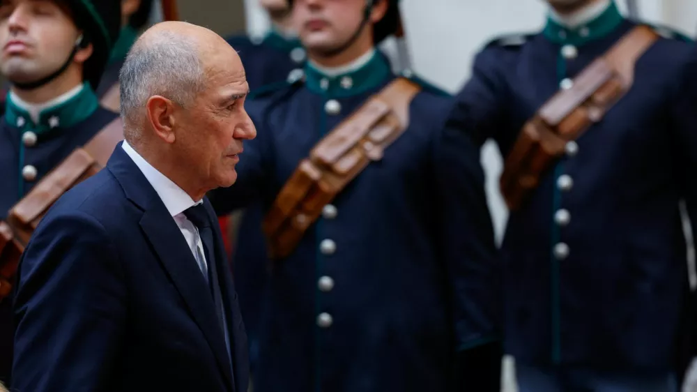 Slovenia's Prime Minister Janez Jansa reviews the honour guard at Chigi Palace as he meets Italian Prime Minister Giorgia Meloni (not pictured) in Rome, Italy, October 5, 2026. REUTERS/Remo Casilli