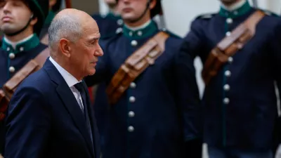 Slovenia's Prime Minister Janez Jansa reviews the honour guard at Chigi Palace as he meets Italian Prime Minister Giorgia Meloni (not pictured) in Rome, Italy, October 5, 2026. REUTERS/Remo Casilli