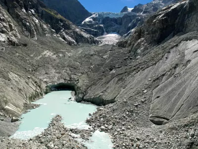 FILE PHOTO: A drone view shows meltwater forming a small lake at the tongue of the Mont Mine glacier on a warm summer day amid climate change in Ferpecle near Evolene, Switzerland, September 3, 2026. REUTERS/Denis Balibouse/File photo