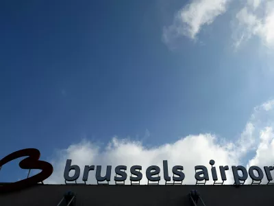 FILE PHOTO: The logo of Brussels international airport is seen outside the terminal in Zaventem, Belgium March 31, 2025. REUTERS/Yves Herman/File Photo