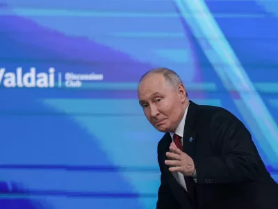 Russian President Vladimir Putin gestures as he attends a plenary session of the Valdai Discussion Club in Moscow, Russia, October 1, 2026. REUTERS/Ramil Sitdikov   TPX IMAGES OF THE DAY