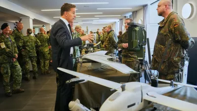 Secretary General of NATO Mark Rutte inspects military equipments during a visit of the 1. German-Netherlands Corps in Muenster, Germany, Thursday, Oct. 1, 2026. (AP Photo/Martin Meissner)