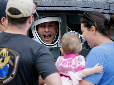NASA astronaut Luke Delaney reacts to family members, as he departs for the launch pad at the Kennedy Space Center in Cape Canaveral, Florida, US, October 1, 2026. REUTERS/Philip Scott Andrews   TPX IMAGES OF THE DAY