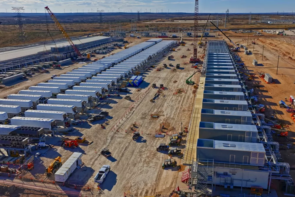 Large data center construction combines civil and mechanical infrastructure with modules and overhead cranes