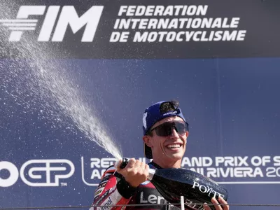 Spain's rider Marc Marquez of the Ducati Lenovo Team celebrates after winning the MotoGP race of the San Marino and the Rimini Riviera Grand Prix in Misano Adriatico, Italy, Sunday, Sept. 13, 2026. (AP Photo/Antonio Calanni)