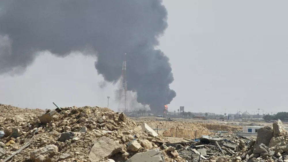 Black smoke and flames rise from an oil facility in an industrial area in southern Riyadh, Saudi Arabia, Saturday, Oct. 3, 2026. (AP Photo)