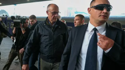 German Chancellor Friedrich Merz arrives at a railway station, amid Russia's attack on Ukraine, in Kyiv, Ukraine, October 4, 2026. REUTERS/Alina Smutko