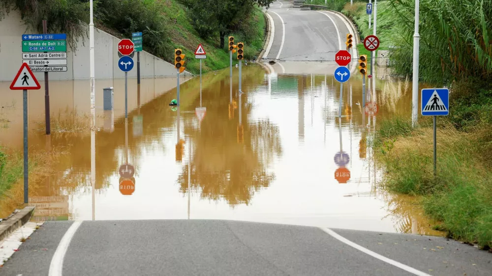 A flooded section of a road, as Spain's meteorological agency AEMET issues a red alert for Catalonia, near Barcelona, Spain, October 4, 2026. REUTERS/Albert Gea