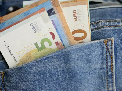 Close of various euro banknotes in a jeans pocket,Image: 1140212646, License: Royalty-free, Restrictions:, Model Release: no 