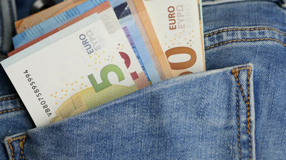 Close of various euro banknotes in a jeans pocket,Image: 1140212646, License: Royalty-free, Restrictions:, Model Release: no 