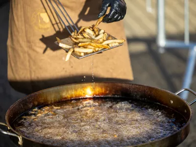 IMAGE DISTRIBUTED FOR IDAHO POTATO COMMISSION - Fresh-cut Idaho&reg; potatoes are fried onsite during an attempt by the Idaho Potato Commission and Spud Daddy to break the Guinness World Records title for the largest serving of French fries at Boise Potato Days in Boise, Idaho, on Friday, Oct. 2, 2026. (Kyle Green/AP Content Services for Idaho Potato Commission)
