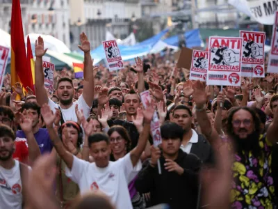 People take part in a protest against fascism and the housing crisis in Puerta del Sol square, where a camp has been set up, demanding political action to stop evictions and address the housing crisis, following the eviction of an 87-year-old woman from her home, in Madrid, Spain, October 3, 2026. REUTERS/Alejandro Martinez Velez