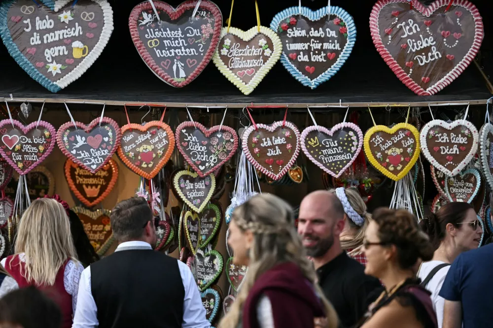 People gather on the last day of the 191st Oktoberfest, the world's largest beer festival in Munich, Germany, October 4, 2026. REUTERS/Angelika Warmuth