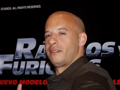 U.S. actor Vin Diesel gestures as he poses for photographers during an event to promote his new film "Fast and Furious" in Mexico City, Friday, March. 27, 2009. (AP Photo/Marco Ugarte)