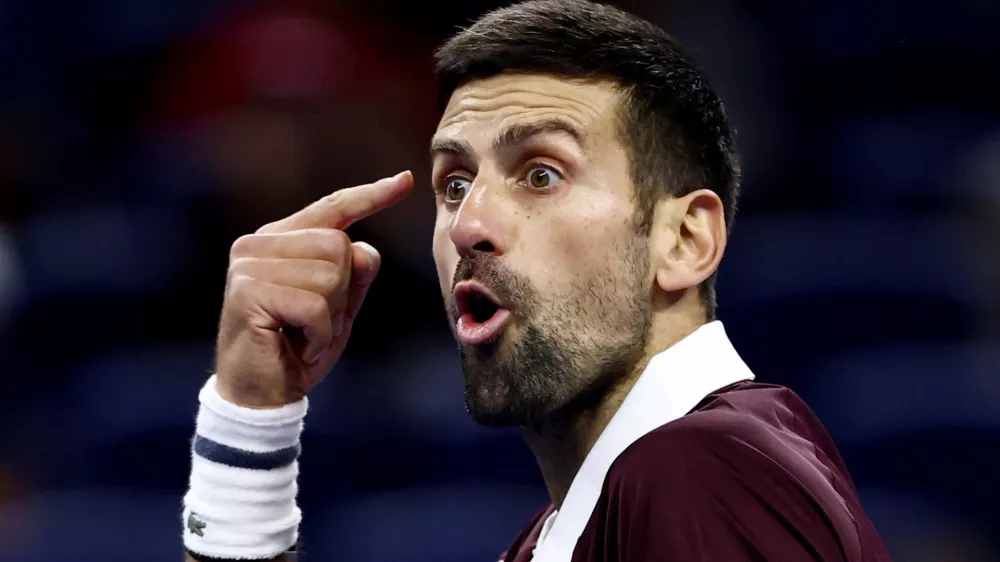 Tennis - China Open - National Tennis Center, Beijing, China - October 4, 2026 Serbia's Novak Djokovic reacts during his quarterfinal match against Germany's Alexander Zverev REUTERS/Tingshu Wang