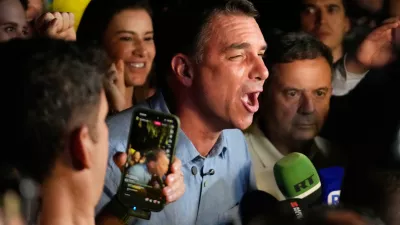 Opposition presidential candidate Sen. Flavio Bolsonaro speaks after advancing to a runoff election following the first round of the presidential election in Brasilia, Brazil, Sunday, Oct. 4, 2026. (AP Photo/Eraldo Peres)