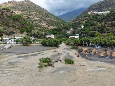 An aerial view of a flooded area near Ierapetra town, on the island of Crete, southern Greece, Saturday, Oct. 3, 2026, as severe weather causes flooding, road damage and widespread disruption across the island. (InTime News via AP)